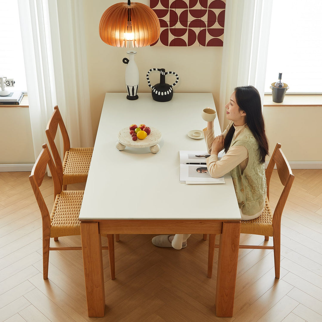 Loft Home wooden dining table from the Tables on Sale collection, paired with elegant chairs, perfect for enhancing modern and cozy dining settings.