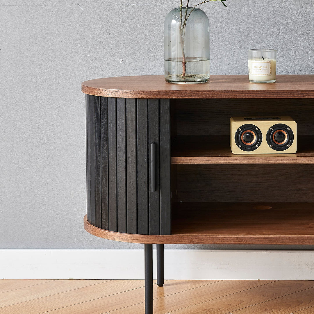 Tambour door storage cabinet by Loft Home, featuring sleek black slatted doors and wooden shelves, combining modern style with functional design for organized living spaces.