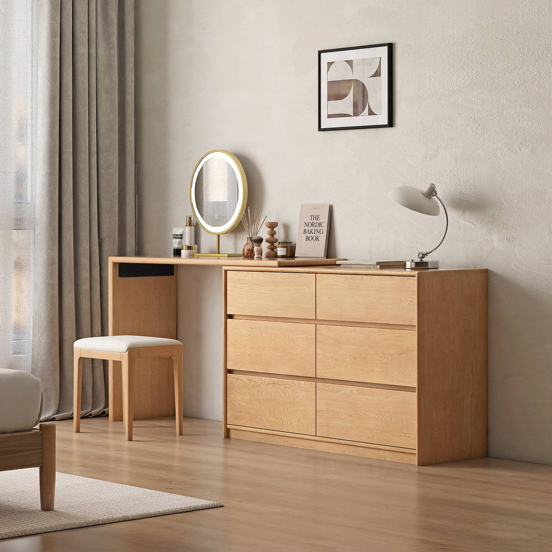 Elegant wooden dressing table with a sleek design, featuring spacious drawers and a stylish mirror, ideal for enhancing bedroom organization and aesthetics.