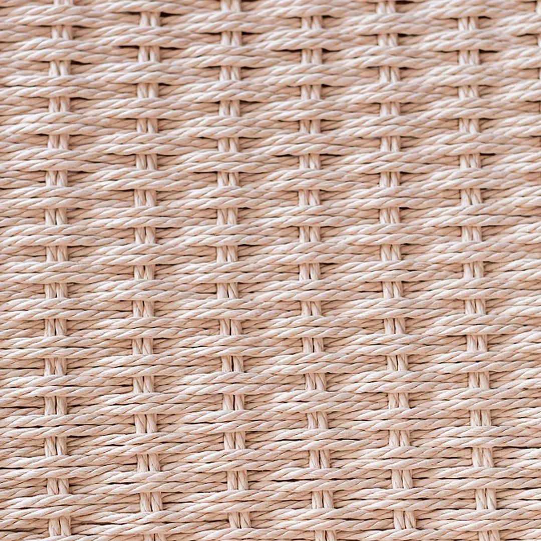 Woven rope furniture texture with tightly braided natural fibres, adding visual warmth and artisanal character to modern living spaces by Loft Home.