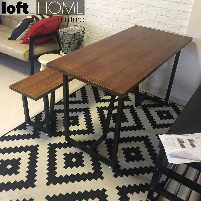 Industrial pine wood dining table slim in close up details.