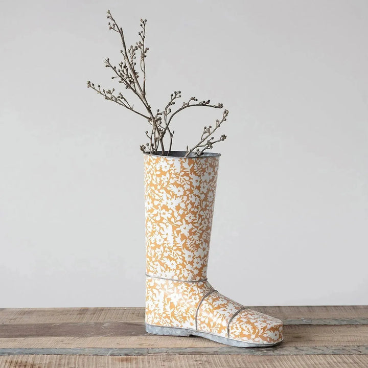 10-1/2"l x 5-1/2"w x 12-1/2"h decorative metal garden boot w/ floral pattern, mu with context.