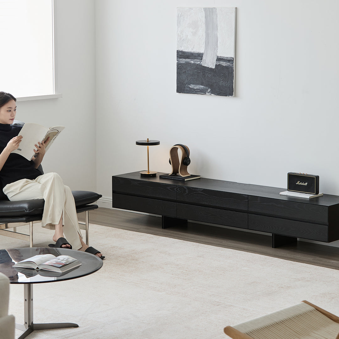 Minimalist ash wood tv console shadow in panoramic view.