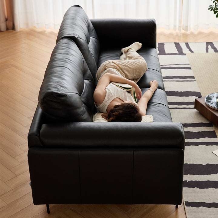 Scandinavian microfiber leather 2 seater sofa black in panoramic view.