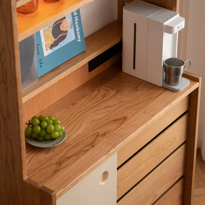 Scandinavian cherry wood storage side cabinet time in still life.