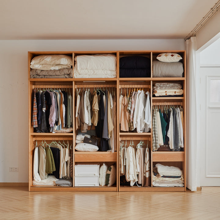 Scandinavian cherry wood sliding door wardrobe autumn in close up details.