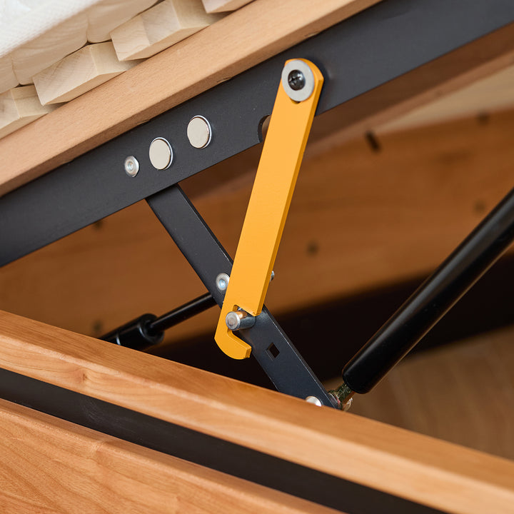 Scandinavian cherry wood storage bed toast in still life.