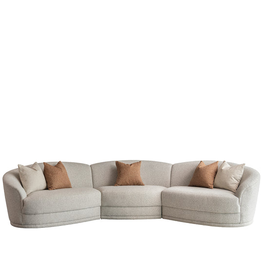Modern boucle fabric modular sectional 5 seater sofa curva in white background.