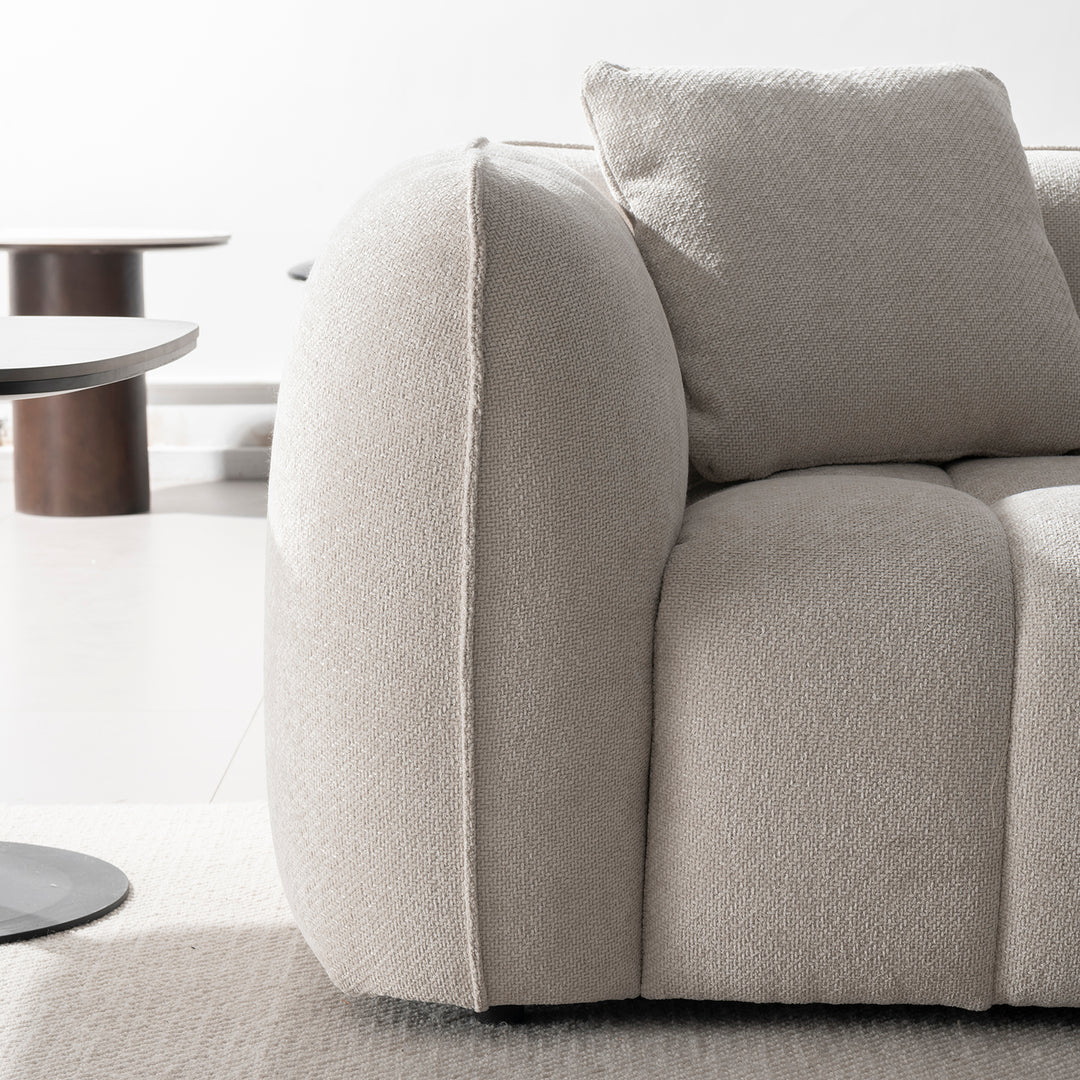Cream mixed weave fabric 1 seater sofa puddy color swatches.