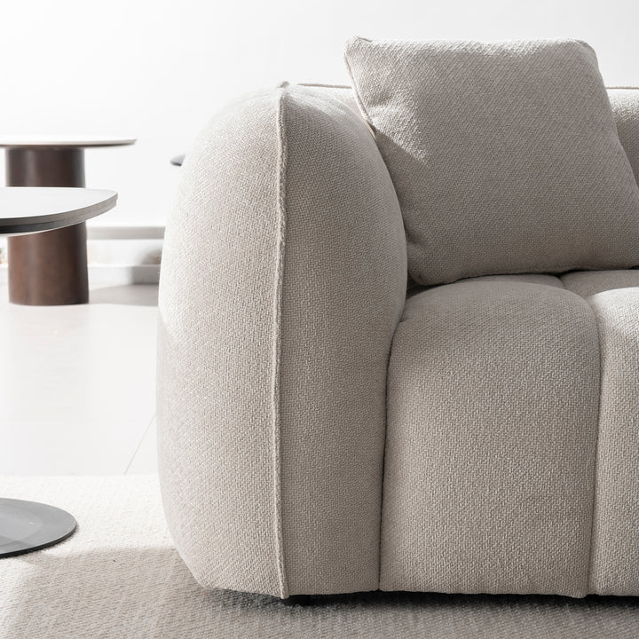 Cream mixed weave fabric 1 seater sofa puddy color swatches.
