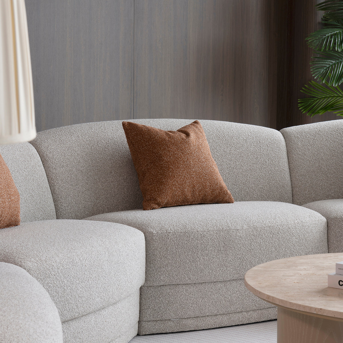 Modern boucle fabric modular sectional 6 seater sofa curva in real life style.