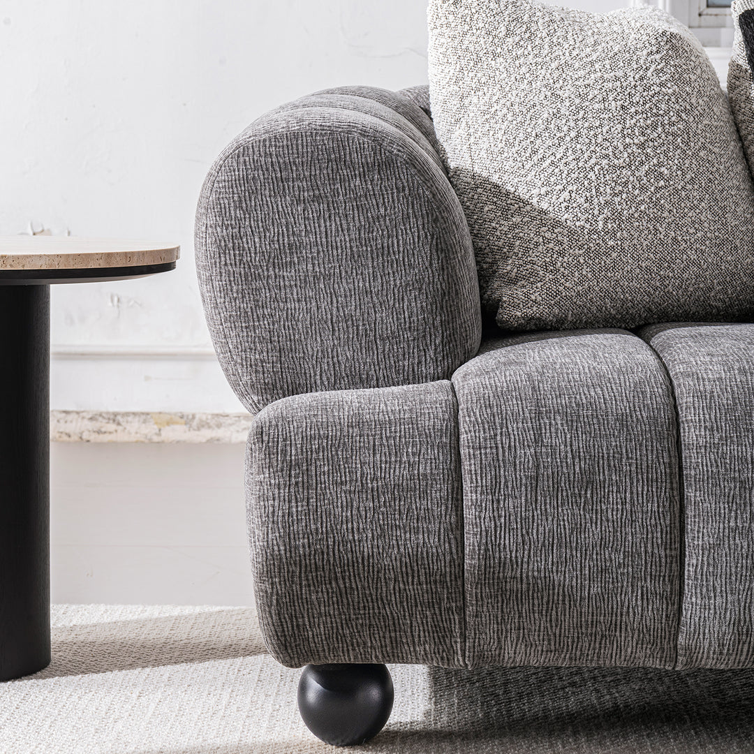 Modern velvet fabric 3 seater sofa raven with context.