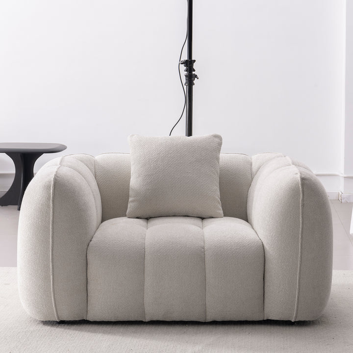 Cream mixed weave fabric 1 seater sofa puddy in real life style.