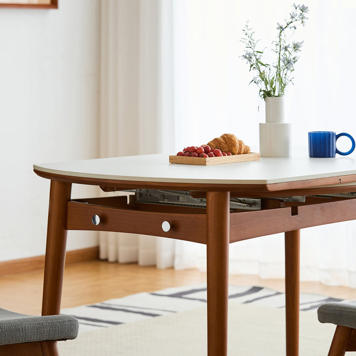 Vintage sintered stone extendable dining table minima conceptual design.