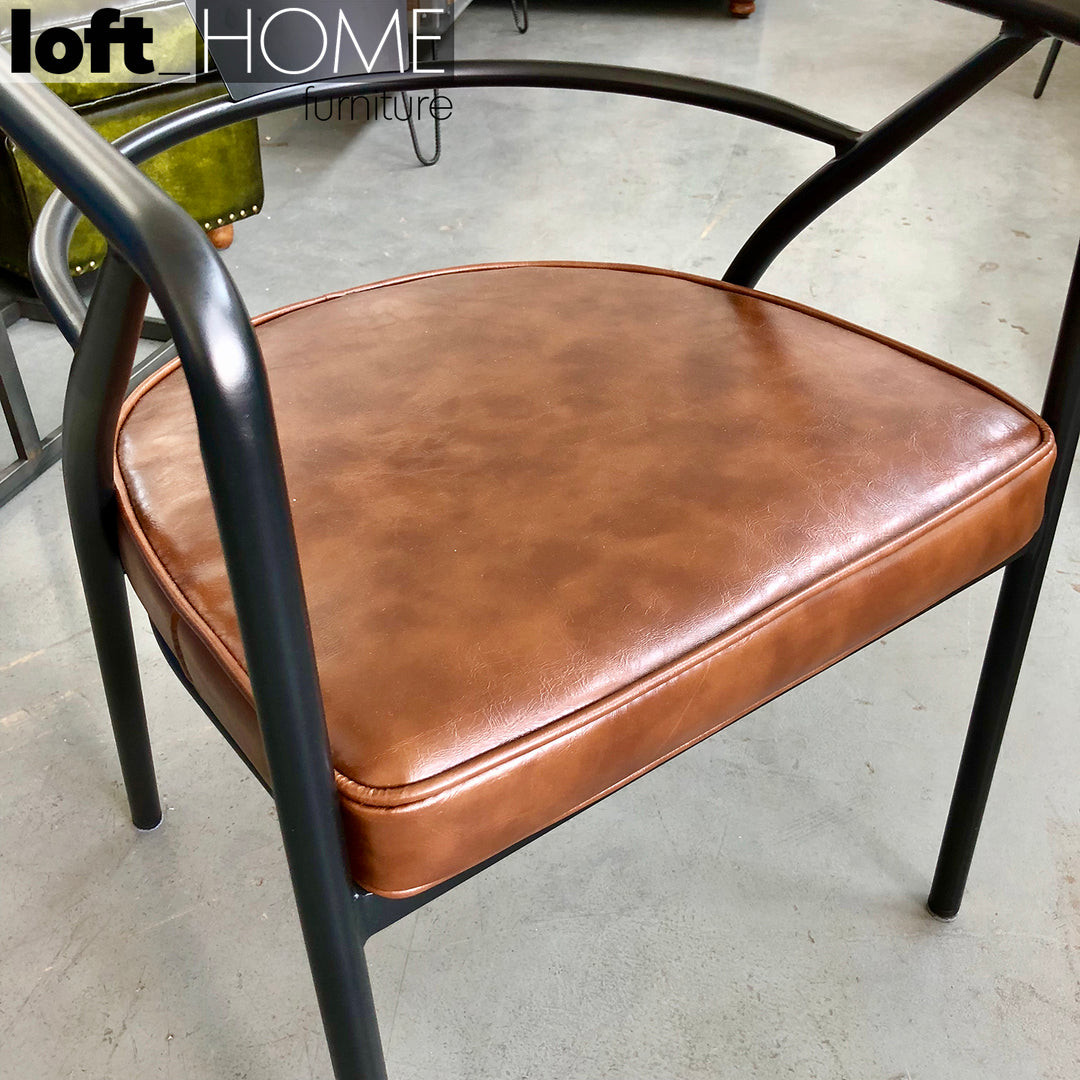 Industrial PU Leather Dining Chair ROUNDARM In-context