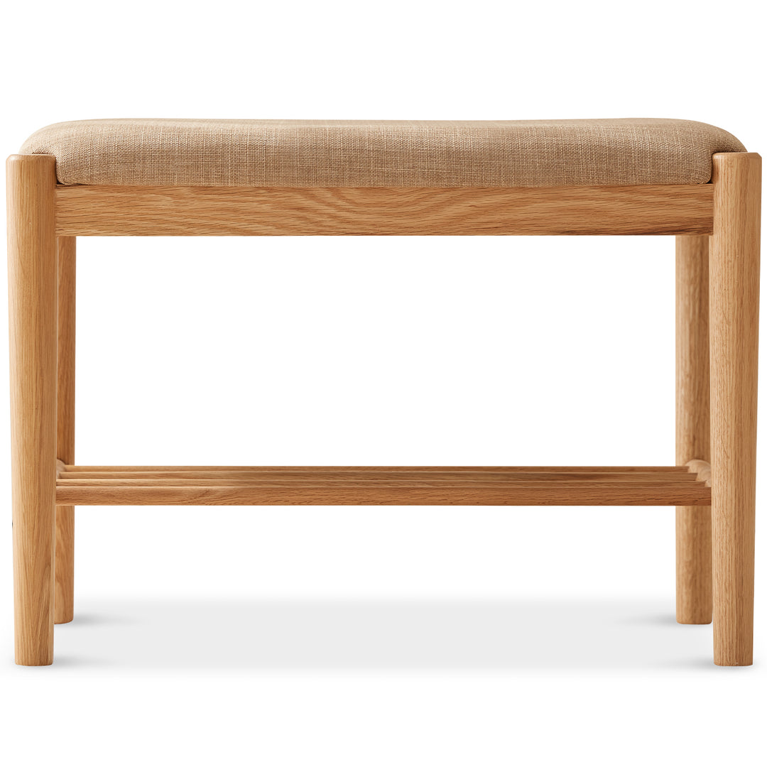 Scandinavian oak wood shoe changing bench fuji in still life.