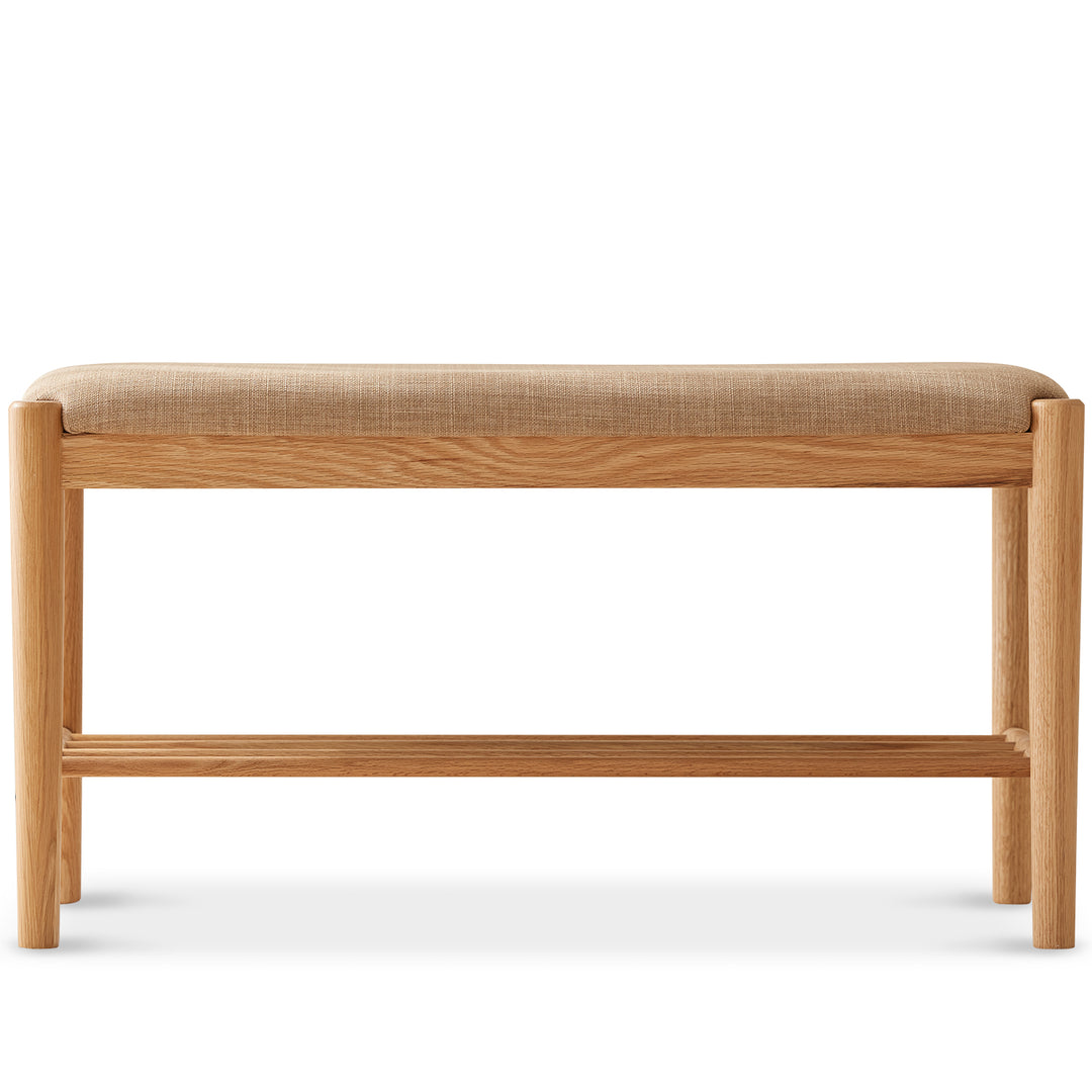 Scandinavian oak wood shoe changing bench fuji in white background.