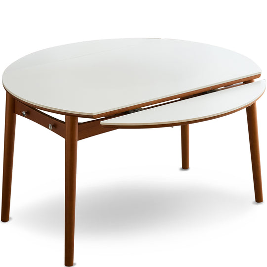 Vintage sintered stone extendable dining table minima in white background.