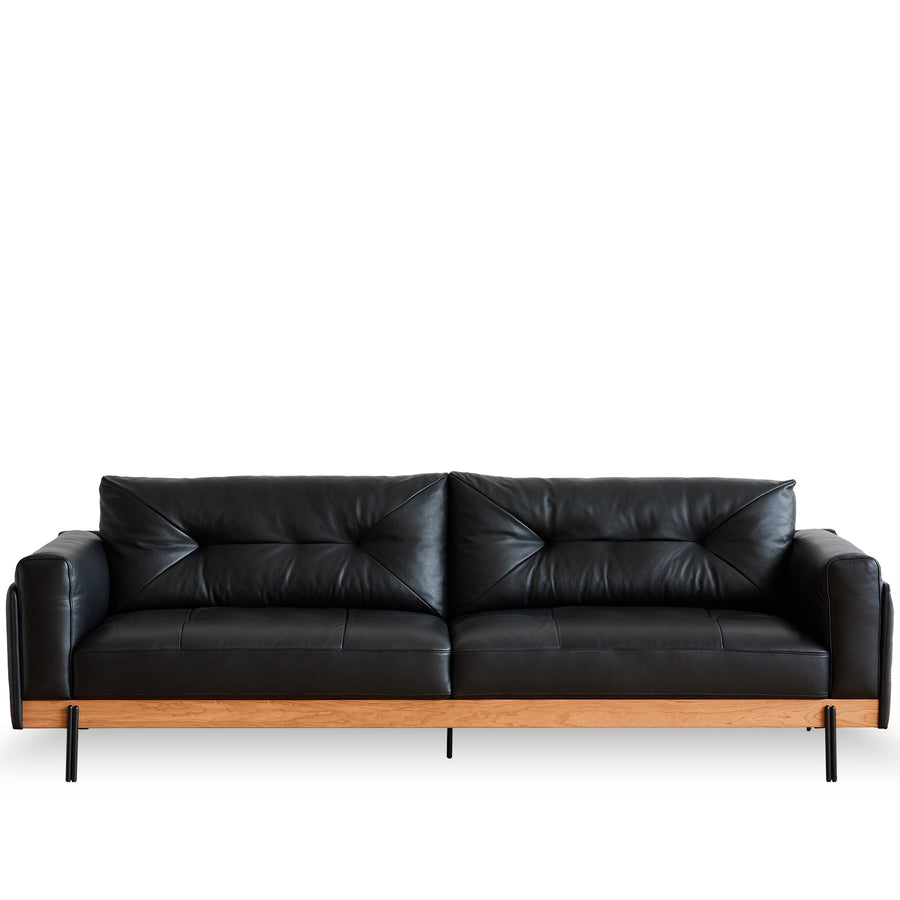 Scandinavian microfiber leather 4 seater sofa black in white background.