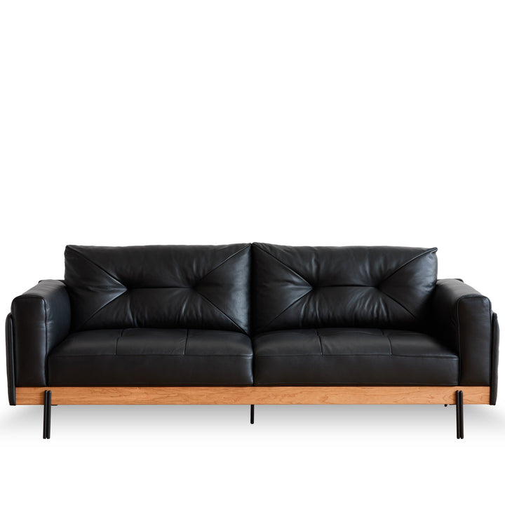 Scandinavian microfiber leather 3 seater sofa black in white background.