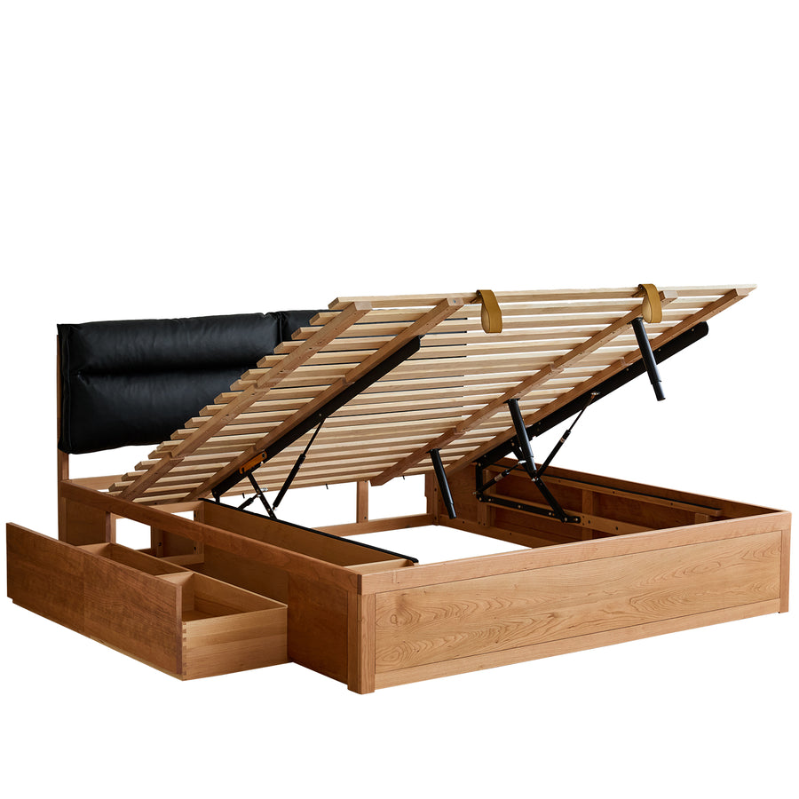 Wooden bed frame with storage drawers on a white background