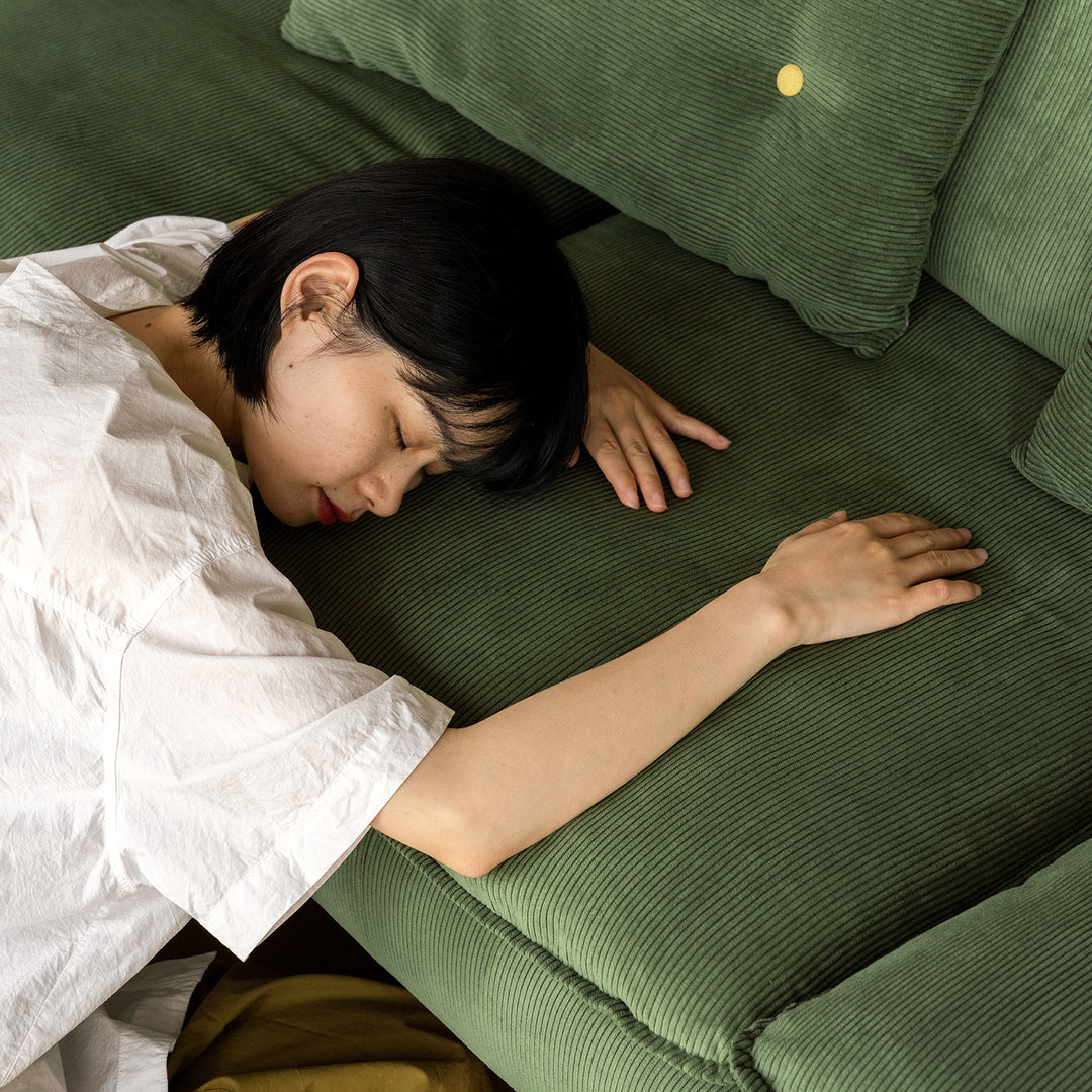 Scandinavian premium corduroy velvet fabric sofa cover in close up details.