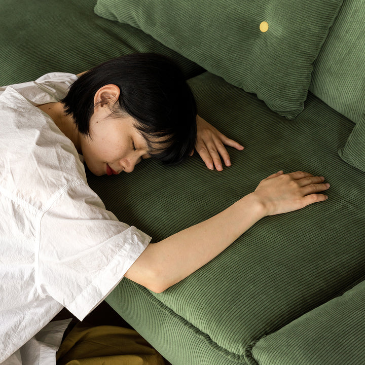 Scandinavian premium corduroy velvet fabric sofa cover in close up details.