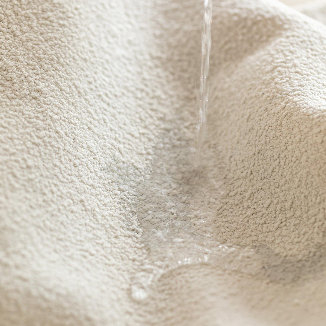 Scandinavian premium boucle fabric sofa cover with context.