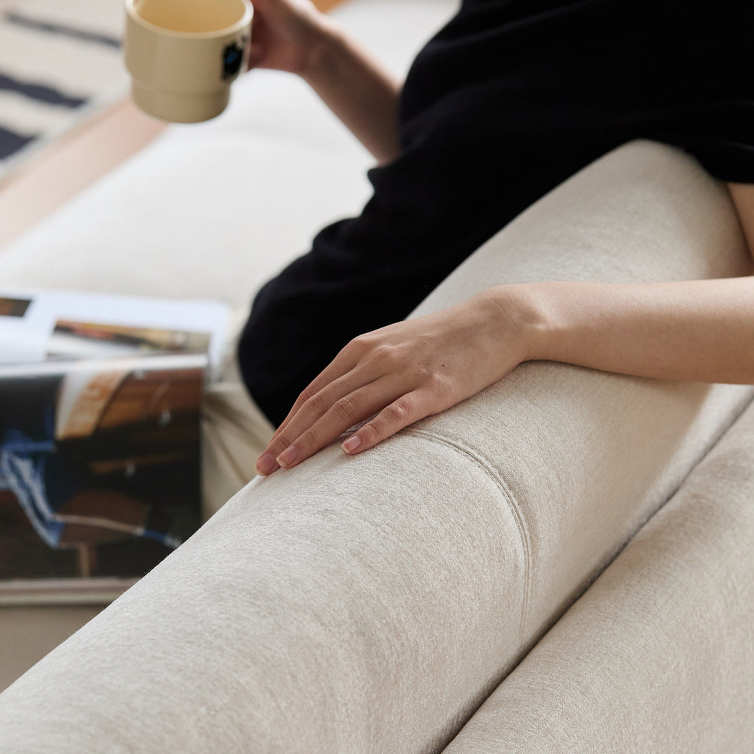 Scandinavian premium chenille velvet fabric sofa cover in panoramic view.