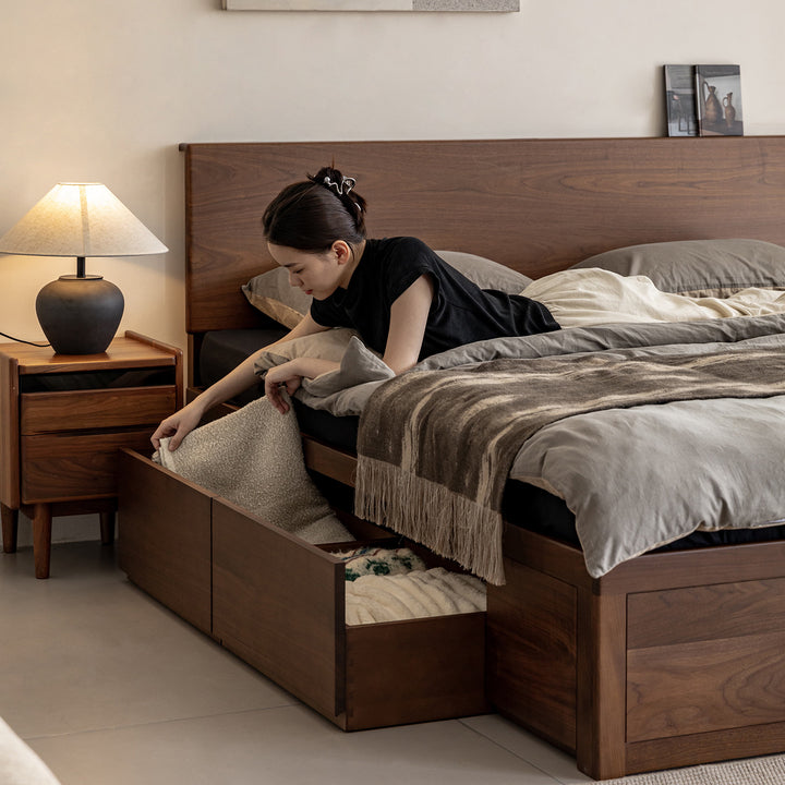 Vintage walnut wood lift-up storage bed with drawer kangaroo in still life.