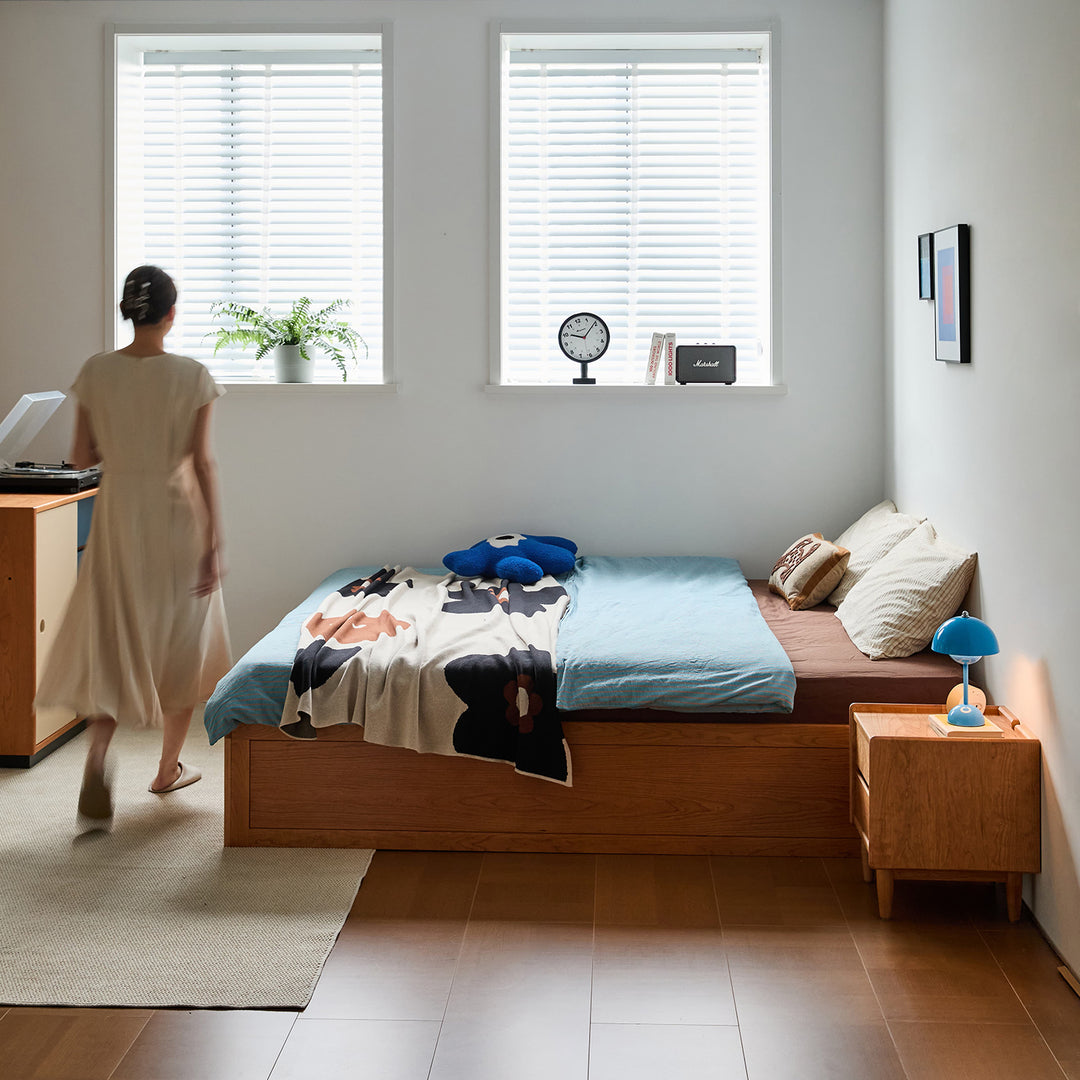 Scandinavian cherry wood lift-up storage platform bed with drawer kangaroo with context.