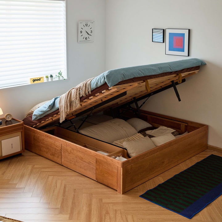 Scandinavian cherry wood lift-up storage platform bed with drawer kangaroo in close up details.