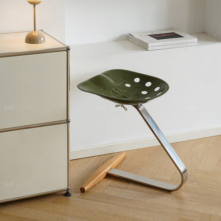 Industrial steel stool mezzadro in panoramic view.