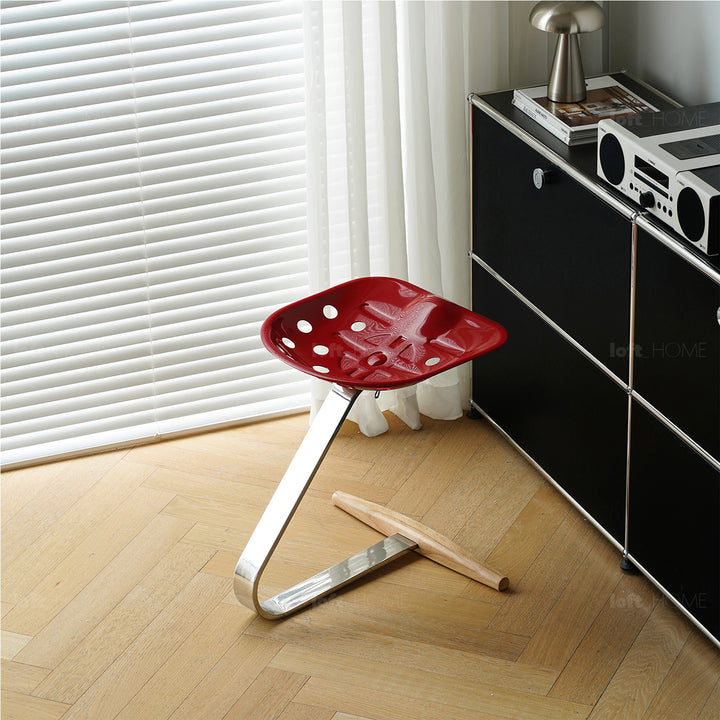 Industrial steel stool mezzadro in still life.