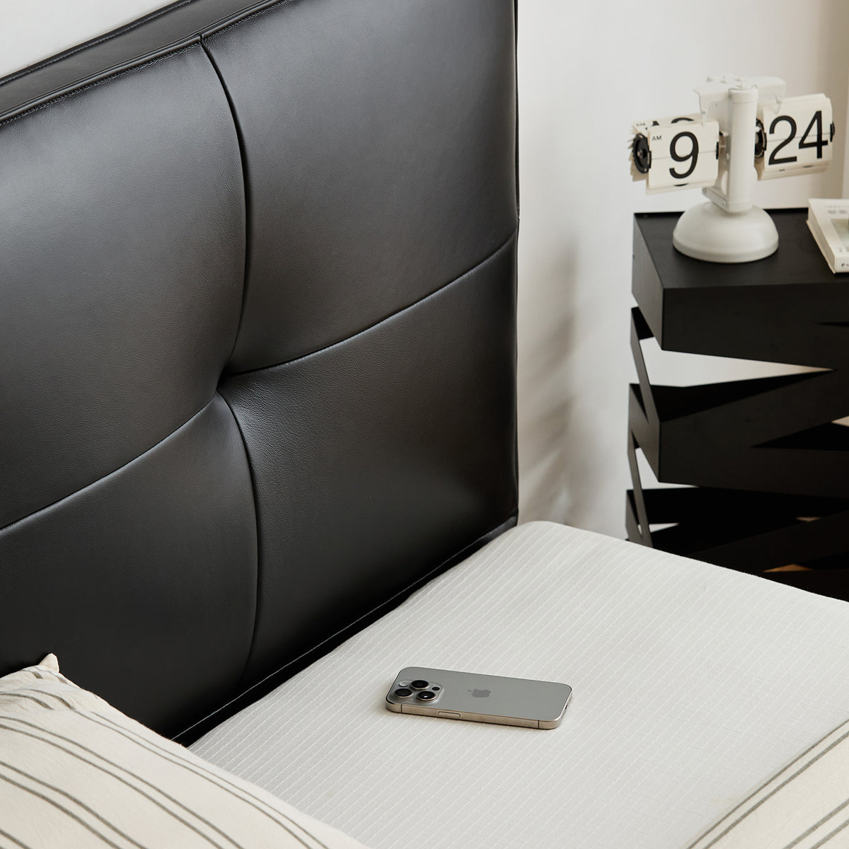 Bauhaus genuine leather bed skillful in white background.