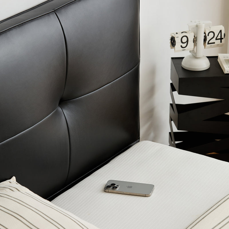Bauhaus genuine leather bed skillful in white background.
