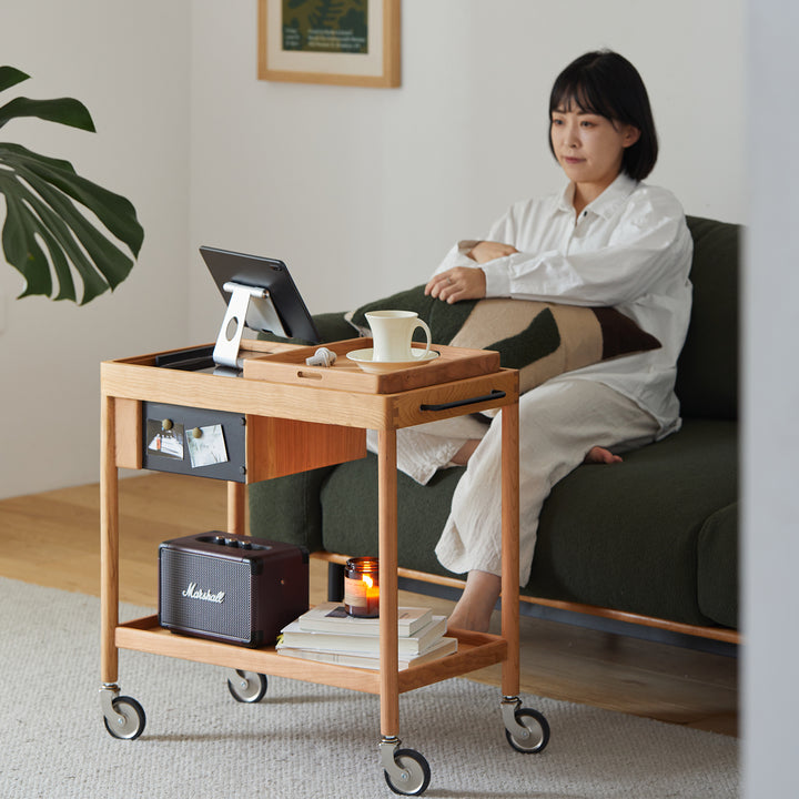 Scandinavian cherry wood wheeled trolley side table pocket size charts.