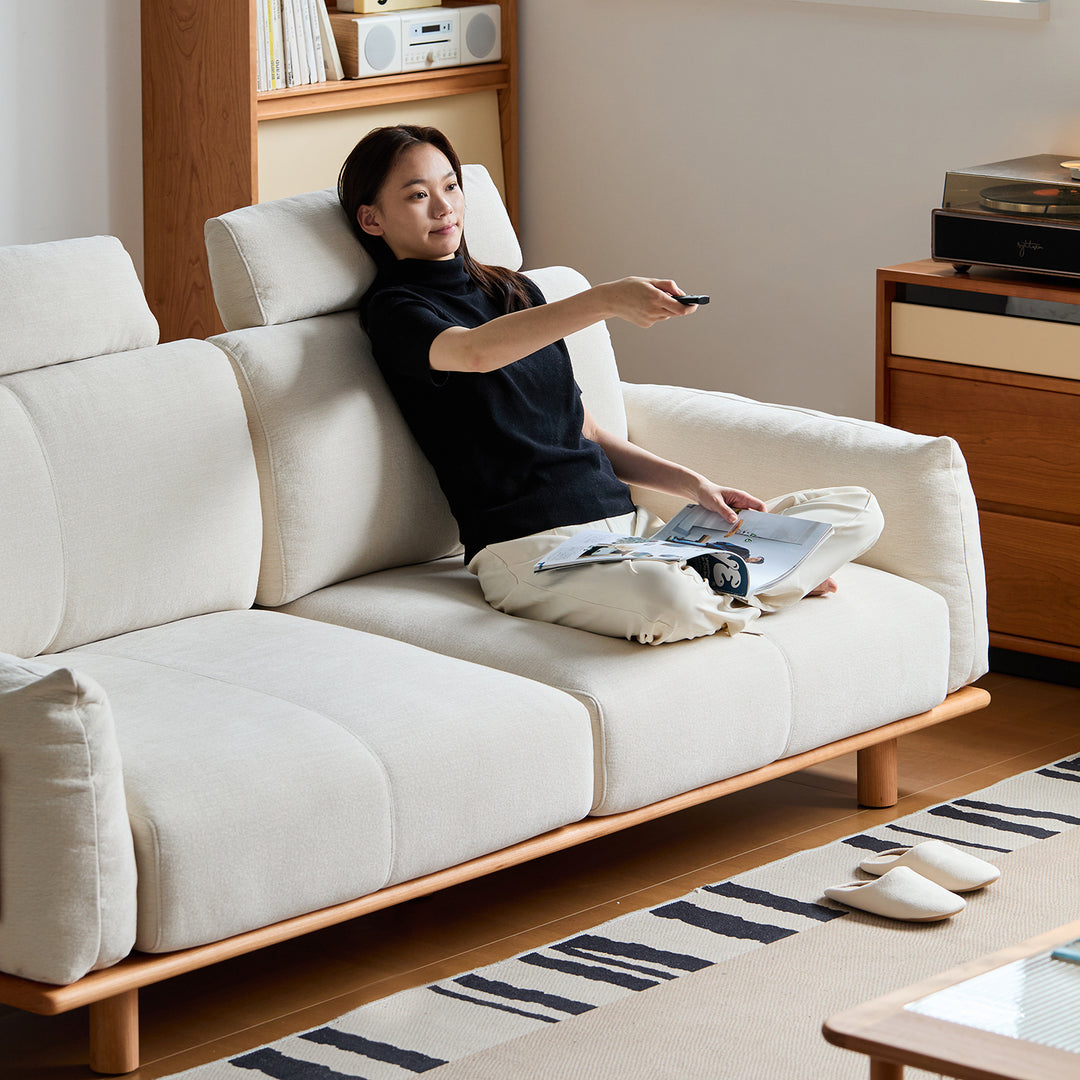 Scandinavian mixed weave fabric 4 seater sofa bessen in real life style.