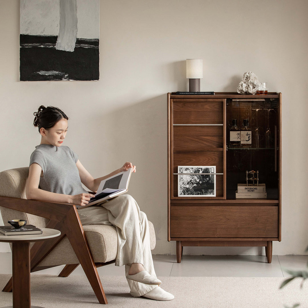 Vintage walnut wood side cabinet vista with context.