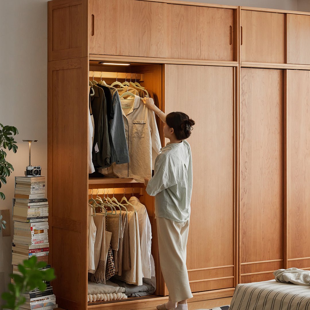 Scandinavian cherry wood sliding door wardrobe autumn color swatches.