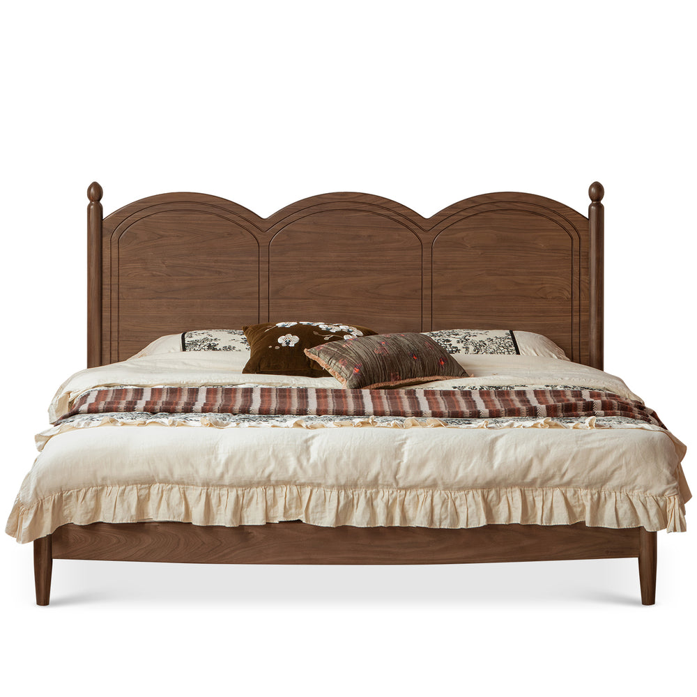 Vintage walnut wood bed midsummer in white background.