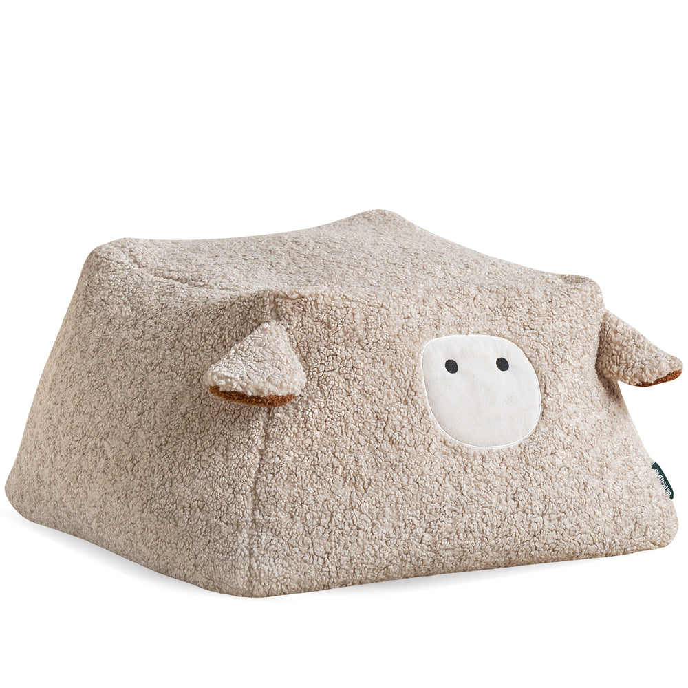 Cream boucle fabric ottoman sheep in white background.
