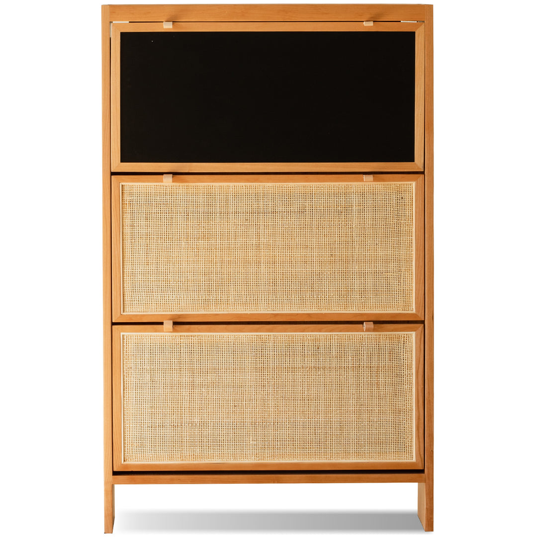 Scandinavian rattan shoe cabinet kangaroo in close up details.