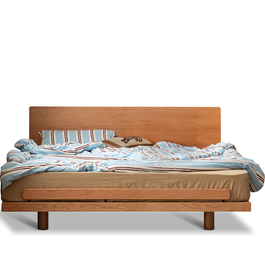 Scandinavian cherry wood bed small in white background.