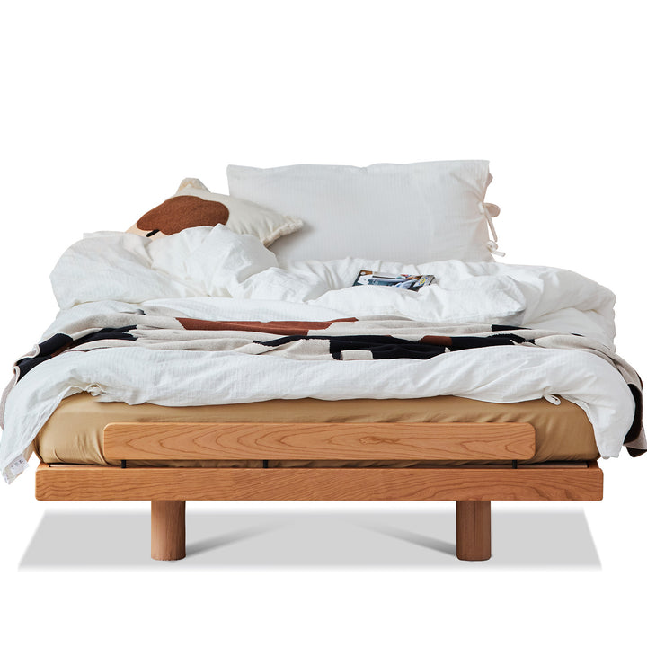 Scandinavian cherry wood platform bed small situational feels.