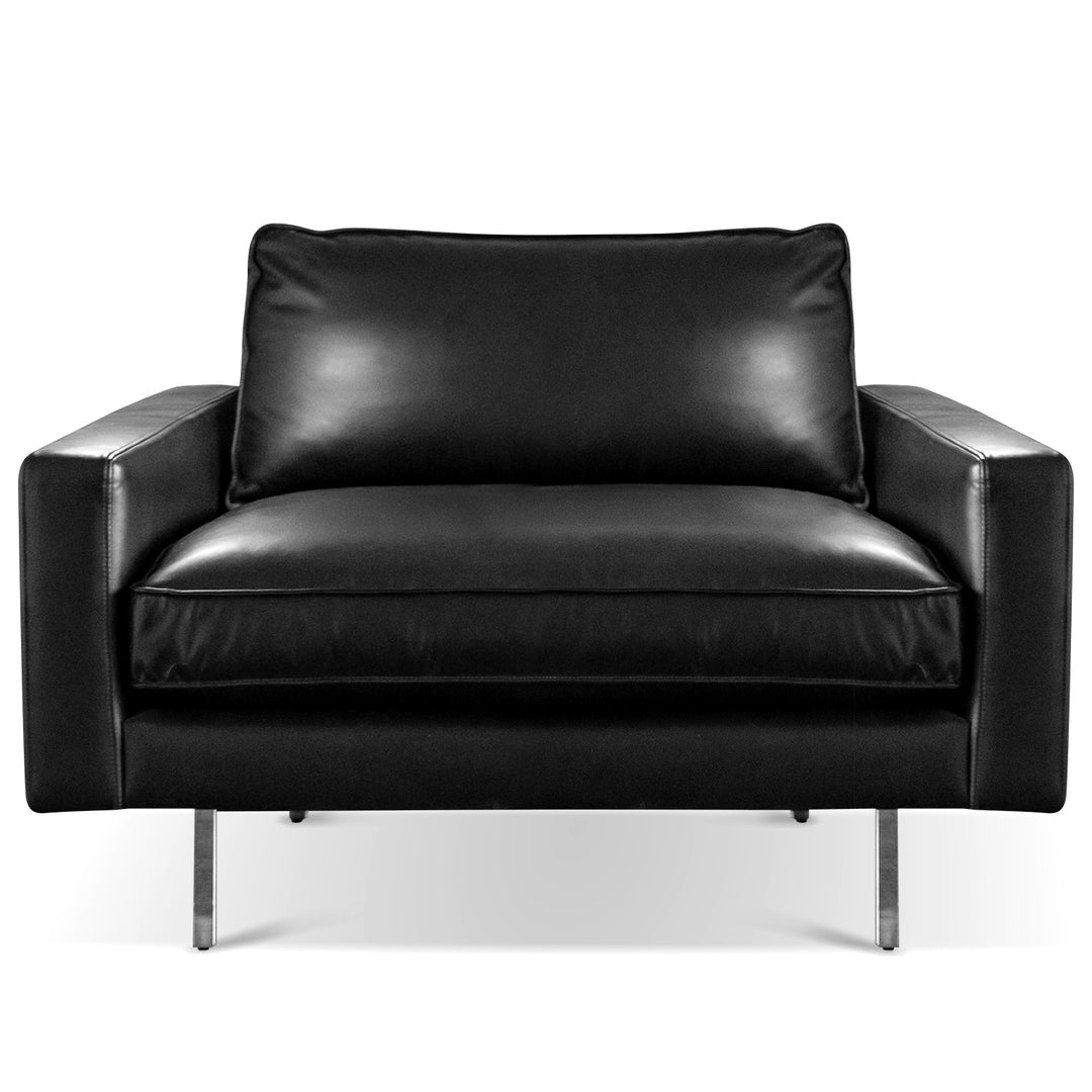 Minimalist genuine leather 1 seater sofa unique in white background.