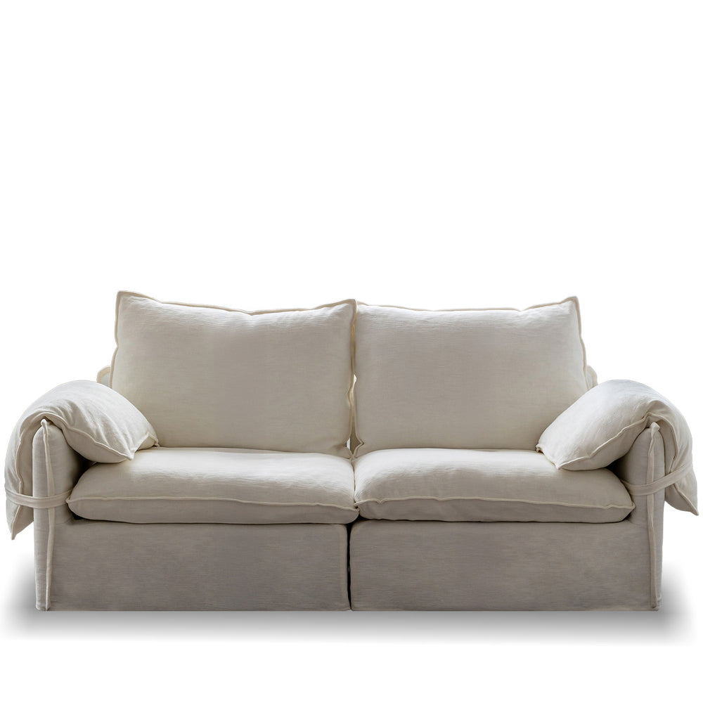Cream cotton fabric 2 seater sofa folding ear in white background.