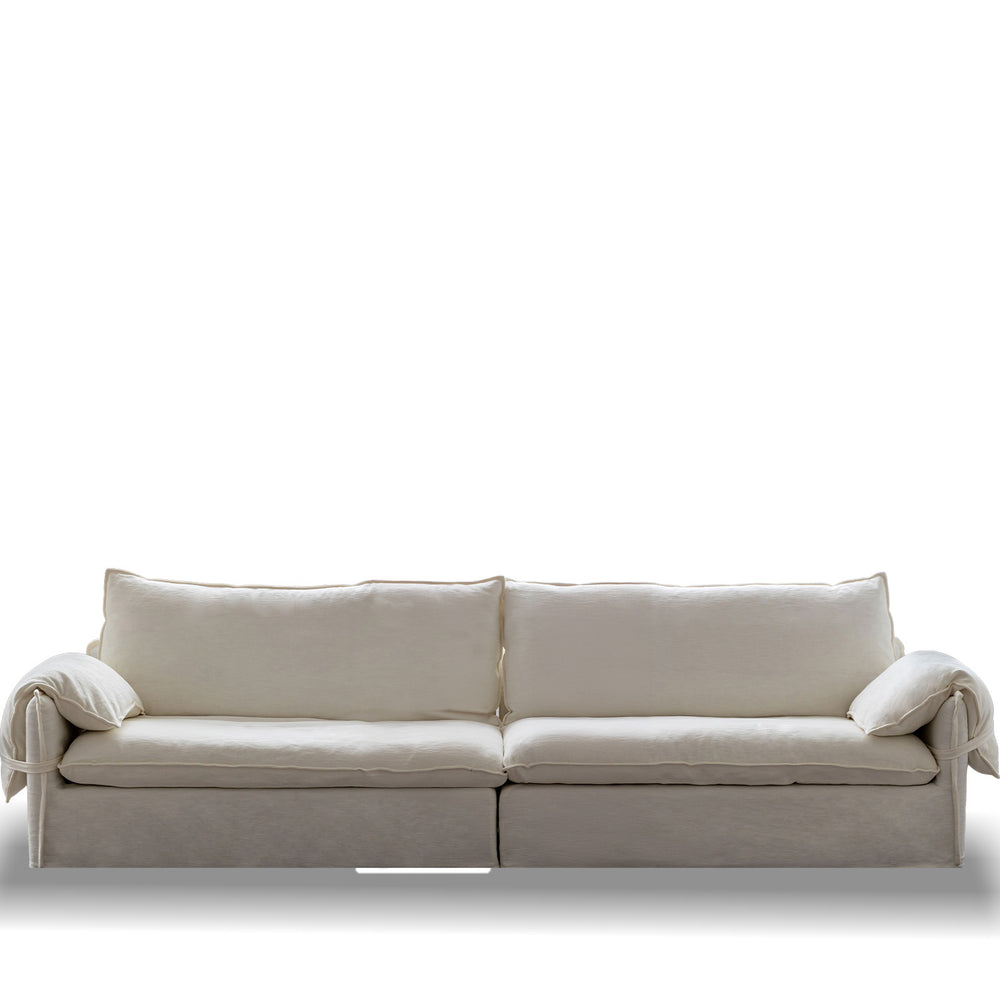 Cream cotton fabric 4 seater sofa folding ear in white background.