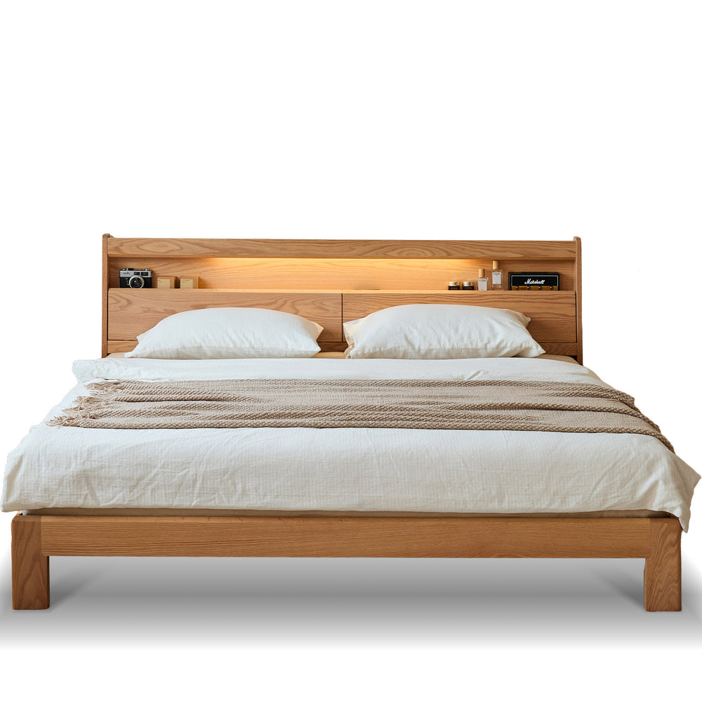 Scandinavian oak wood bed accompany light in white background.