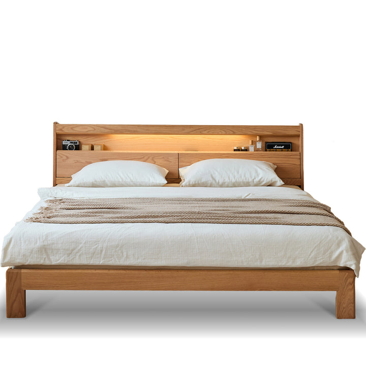 Scandinavian oak wood bed accompany light in white background.